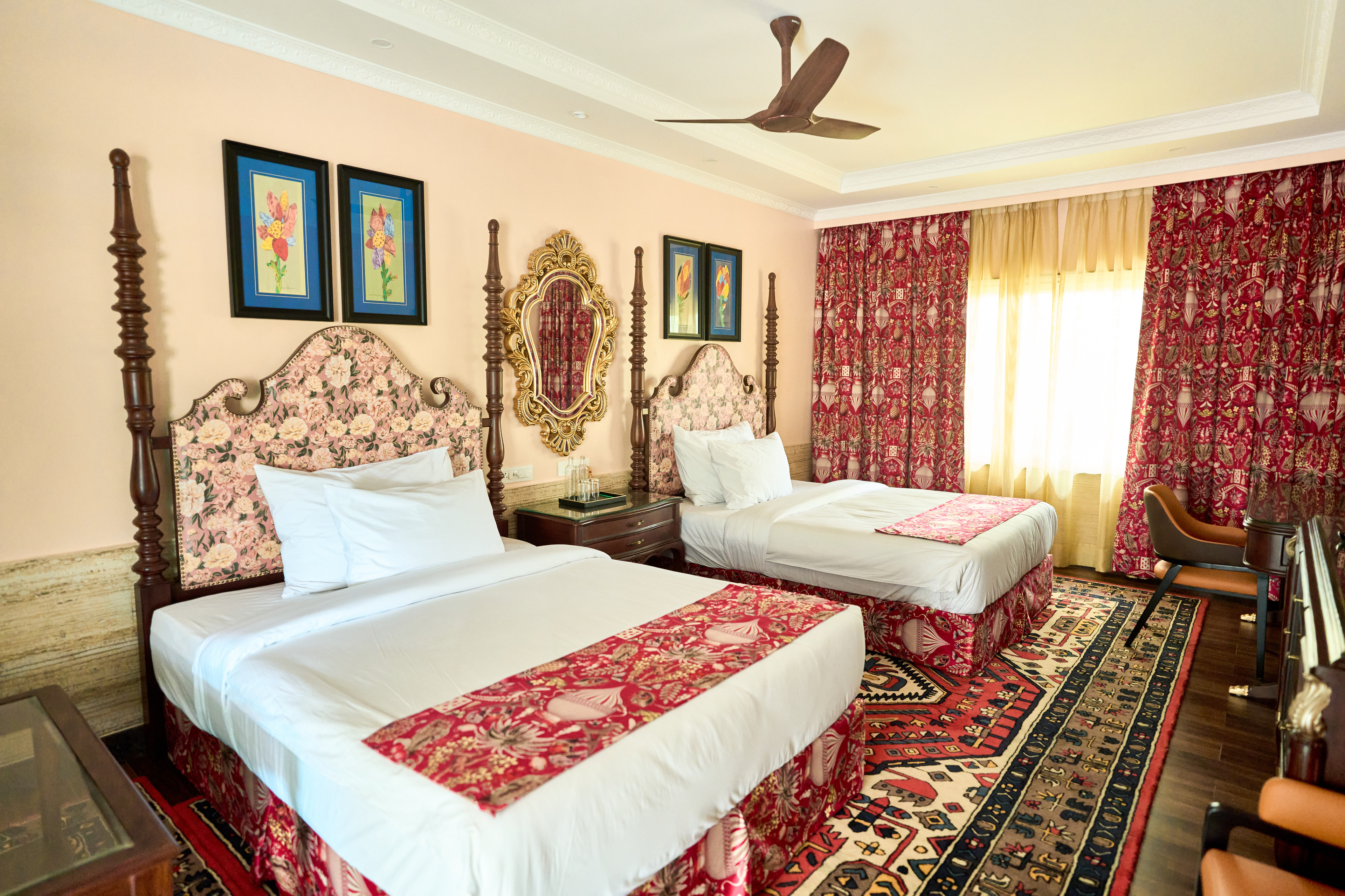 Two four-poster beds in a Premium Room