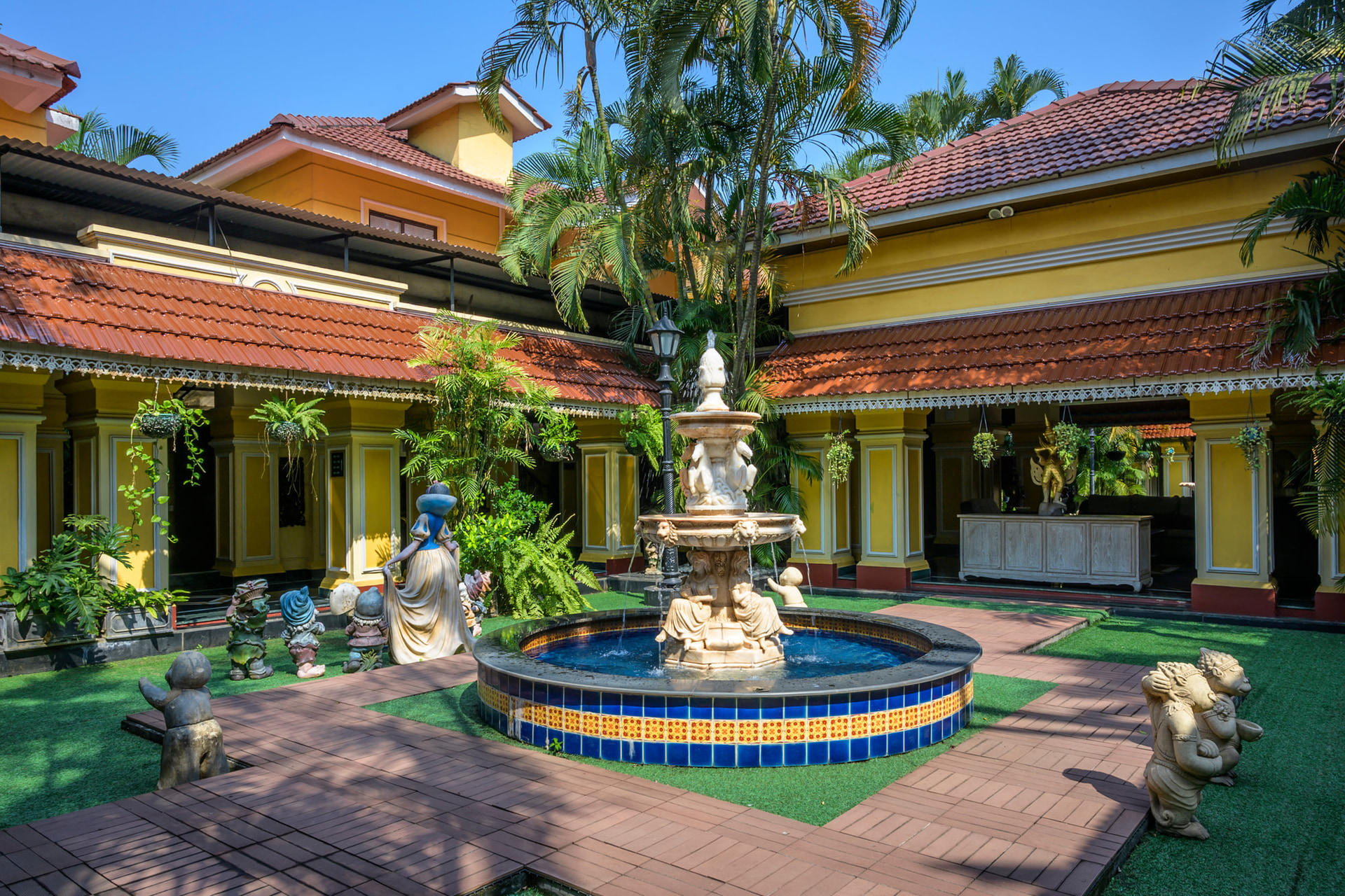 a small pond and a fountain - Mayfair Lagoon, Bhubaneswar
