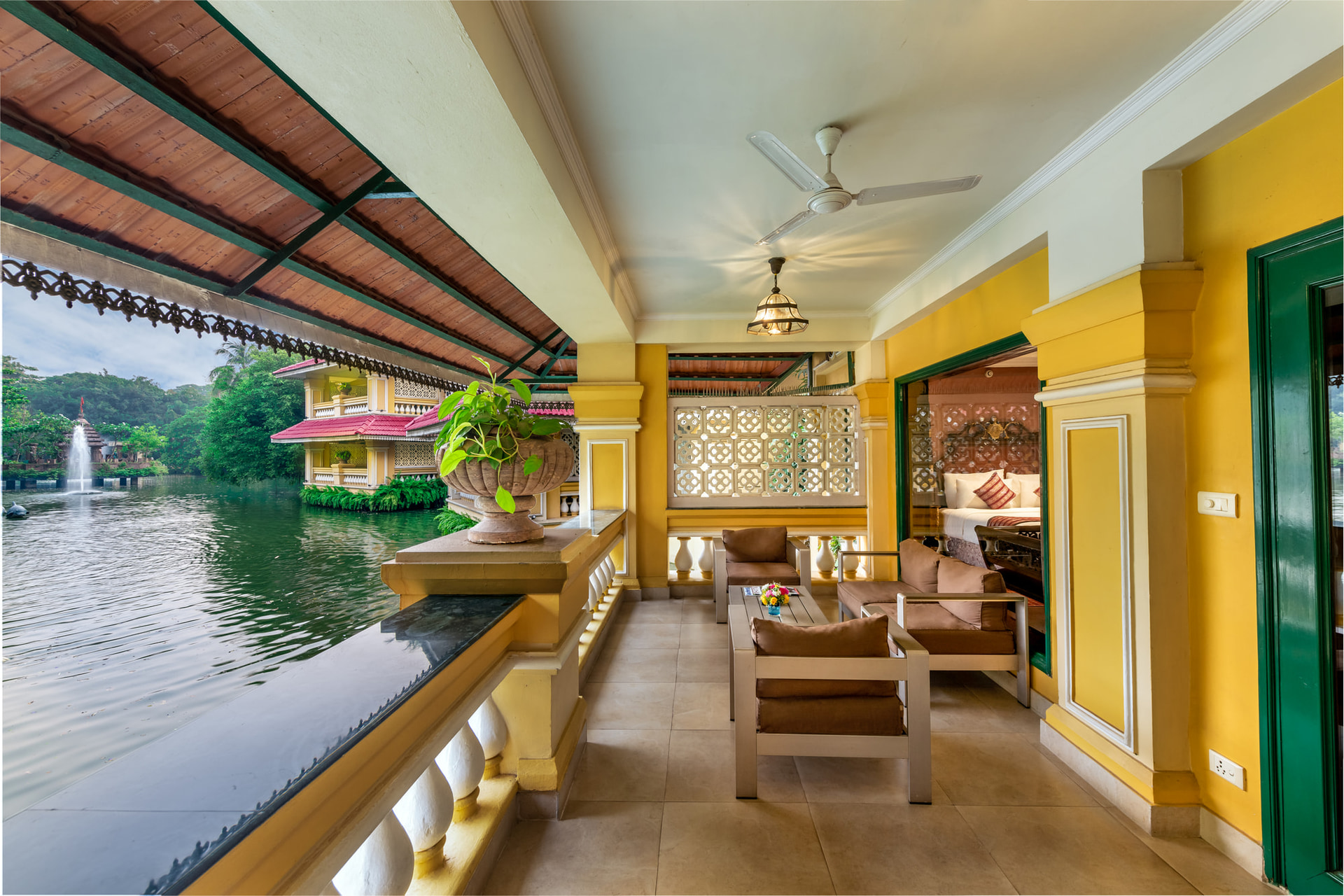 Relaxing houseboat verandah with waterfront view and comfortable seating at Mayfair Lagoon