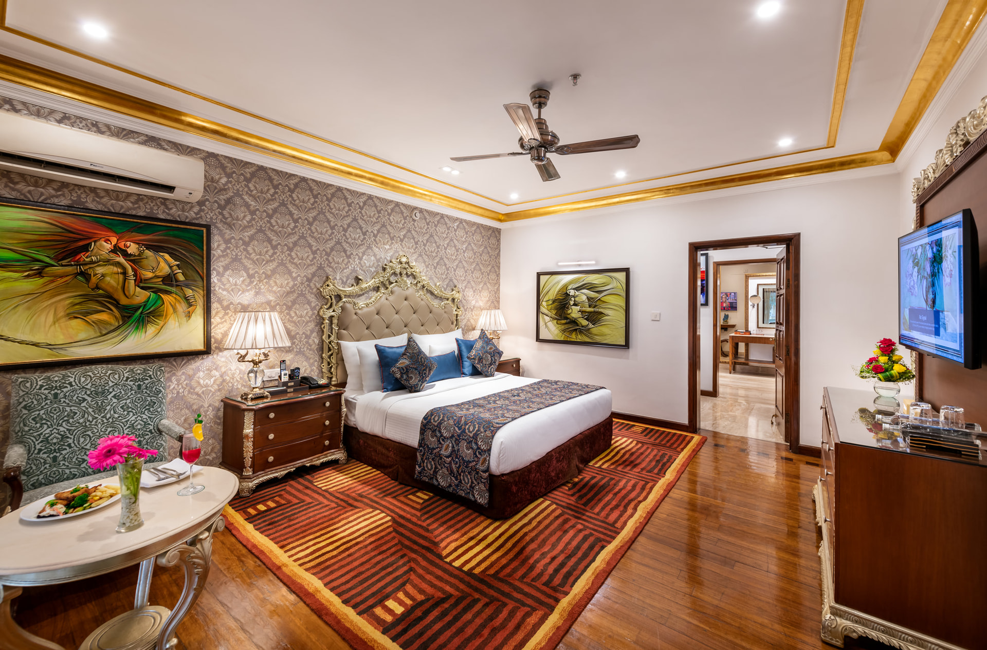 Well-appointed deluxe room with wooden flooring and warm decor at Mayfair Lagoon, Bhubaneswar