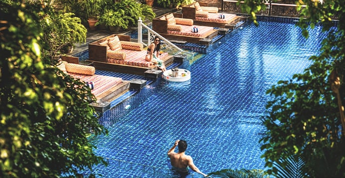 A poolside afternoon at a MAYFAIR resort