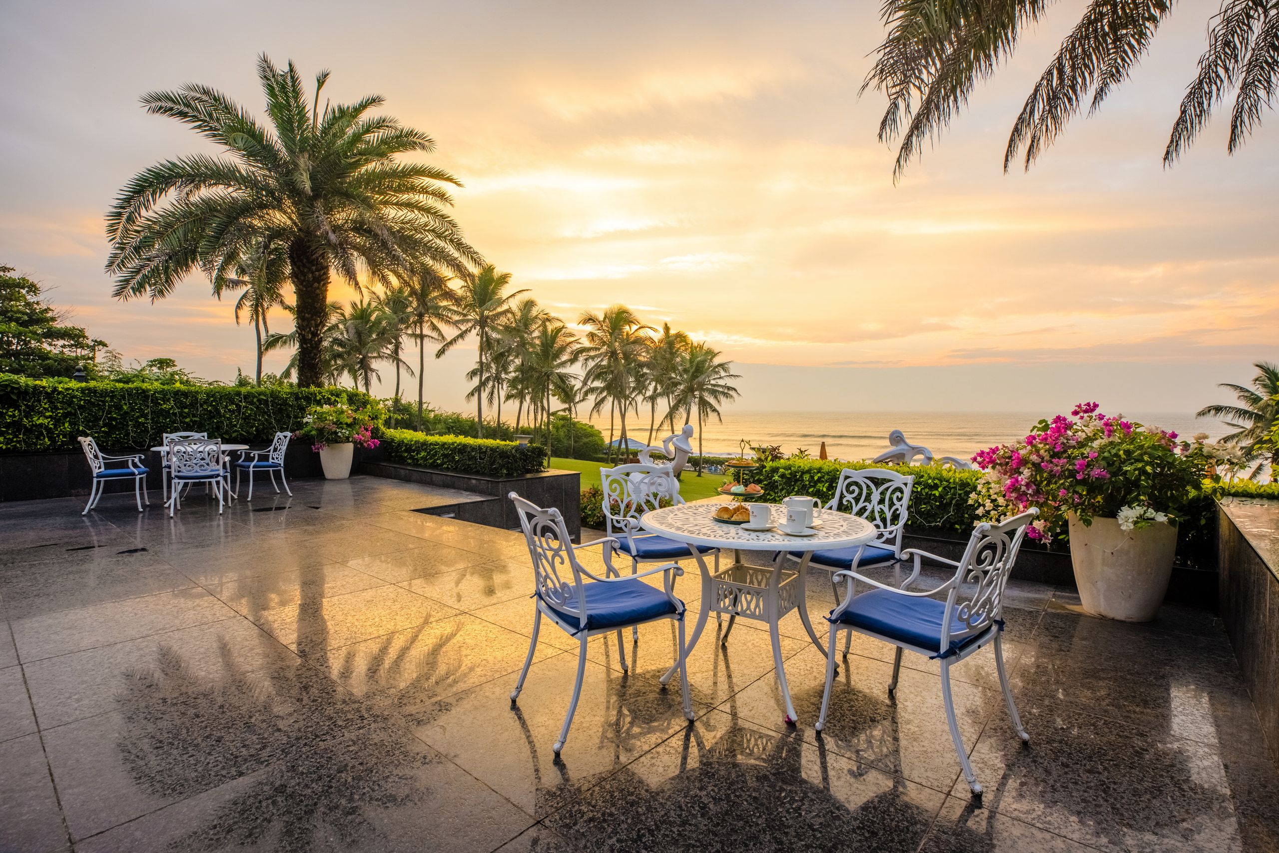 The seafront terrace at MAYFAIR Palm Beach Resort, Gopalpur-on-Sea, at sunset